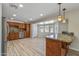 A modern kitchen shows granite counters, stainless appliances, and breakfast bar at 1403 W Wood Dr, Phoenix, AZ 85029