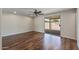 Spacious living room boasts hardwood floors and sliding glass doors to the patio at 1403 W Wood Dr, Phoenix, AZ 85029