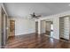 Spacious main bedroom features hardwood floors and large closet with mirrored doors at 1403 W Wood Dr, Phoenix, AZ 85029