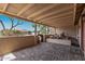 Cozy covered patio with brick flooring, and views of the neighborhood at 1403 W Wood Dr, Phoenix, AZ 85029