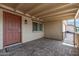Inviting covered porch with brick flooring, and a charming welcome mat at 1403 W Wood Dr, Phoenix, AZ 85029