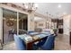 Dining room with access to backyard and open access to kitchen area at 14390 W Desert Flower Dr, Goodyear, AZ 85395