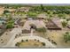 Large single-Gathering home with circular driveway, extensive landscaping, pool and patio in a serene setting at 14539 W Becker Ln, Surprise, AZ 85379