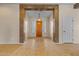 Open entryway featuring tile flooring, a decorative frame and front door with sidelights for natural light at 14539 W Becker Ln, Surprise, AZ 85379