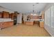 A kitchen with granite countertops, wood cabinets, and stainless steel appliances at 14539 W Becker Ln, Surprise, AZ 85379