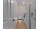 Functional laundry area with washer, dryer, door to the outside, and built-in features at 14539 W Becker Ln, Surprise, AZ 85379