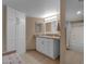 Bathroom features a vanity, mirror, and a shower with a curtain at 16739 E El Lago Blvd # 103, Fountain Hills, AZ 85268