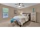 Comfortable bedroom with a ceiling fan, and a bright window, creating a relaxing atmosphere at 16739 E El Lago Blvd # 103, Fountain Hills, AZ 85268