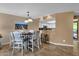 Comfortable dining area situated next to the kitchen and featuring modern lighting at 16739 E El Lago Blvd # 103, Fountain Hills, AZ 85268