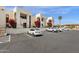 Exterior view of modern building with parking, beautiful landscaping, and architectural details at 16739 E El Lago Blvd # 103, Fountain Hills, AZ 85268