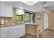 Well-lit kitchen featuring granite counters, ample cabinet space, and stainless steel appliances at 16739 E El Lago Blvd # 103, Fountain Hills, AZ 85268