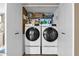 Laundry room featuring a modern side-by-side washer and dryer at 16739 E El Lago Blvd # 103, Fountain Hills, AZ 85268