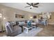 Comfortable living room featuring neutral tones, modern decor, and tile flooring at 16739 E El Lago Blvd # 103, Fountain Hills, AZ 85268