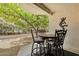 Cozy patio area with a table and chairs, perfect for enjoying the outdoors at 16739 E El Lago Blvd # 103, Fountain Hills, AZ 85268