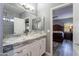 Bathroom features a marble vanity and a shower with designer tile and modern fixtures at 17216 E Salida Dr # B, Fountain Hills, AZ 85268