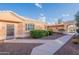 Inviting single-story home showcasing desert landscaping and a tiled roof in a tranquil setting at 17216 E Salida Dr # B, Fountain Hills, AZ 85268