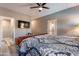 Large main bedroom with wood floors, ceiling fan, and access to a private outdoor space at 17216 E Salida Dr # B, Fountain Hills, AZ 85268