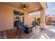 Relaxing patio with a fire pit, ceiling fan and a view of the pool at 17216 E Salida Dr # B, Fountain Hills, AZ 85268