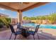 Outdoor patio with fire pit, chairs, and swimming pool in backyard at 17216 E Salida Dr # B, Fountain Hills, AZ 85268