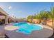 Sparkling pool with desert landscaping providing an ideal setting for relaxation and entertaining at 17216 E Salida Dr # B, Fountain Hills, AZ 85268
