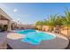 Beautiful backyard with a refreshing pool, hot tub, covered patio, and drought resistant desert landscaping at 17216 E Salida Dr # B, Fountain Hills, AZ 85268