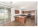 Well-appointed kitchen with center island, stainless appliances, and plenty of counter space at 17507 N Costa Brava Ave, Maricopa, AZ 85139