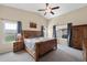 Comfortable main bedroom with vaulted ceilings, a ceiling fan, and great natural light at 1770 W Derringer Way, Chandler, AZ 85286