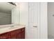 A bathroom vanity with wood cabinets and a shower-tub combo is visible in this image at 18250 N Cave Creek Rd # 147, Phoenix, AZ 85032