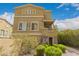 Beautiful multi-story home with well-manicured landscaping and a charming front entrance at 18250 N Cave Creek Rd # 147, Phoenix, AZ 85032