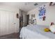Comfortable bedroom with plush carpeting, neutral walls, and ample closet space at 18318 W Pueblo Ave, Goodyear, AZ 85338