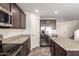 Spacious kitchen featuring granite countertops, stainless appliances, and a central island at 18318 W Pueblo Ave, Goodyear, AZ 85338