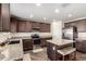 Well-equipped kitchen with stainless steel appliances and granite countertops at 18318 W Pueblo Ave, Goodyear, AZ 85338