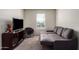 Comfortable living room featuring neutral furniture, decor, and great natural light at 18318 W Pueblo Ave, Goodyear, AZ 85338
