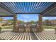 Community barbecue area featuring stainless steel grills and stone countertops, designed for outdoor gatherings at 1900 N 140Th Dr, Goodyear, AZ 85395