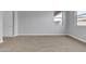 Bright bedroom with soft carpet flooring, creating a comfortable and inviting retreat space at 1900 N 140Th Dr, Goodyear, AZ 85395