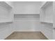 Walk-in closet with rods and shelving at 1900 N 140Th Dr, Goodyear, AZ 85395