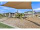 Community playground with slides and shade canopies, perfect for children to play and have fun at 1900 N 140Th Dr, Goodyear, AZ 85395
