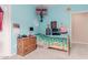 bedroom with turquoise walls, plush carpeting, and a comfy bed at 19043 E Seagull Dr, Queen Creek, AZ 85142
