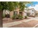 Charming two-story home with a well-manicured front yard and a two car garage at 19043 E Seagull Dr, Queen Creek, AZ 85142
