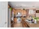 Bright eat-in kitchen with island and stainless appliances at 19043 E Seagull Dr, Queen Creek, AZ 85142
