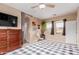Bedroom featuring a ceiling fan, carpet, and a view of the backyard at 19043 E Seagull Dr, Queen Creek, AZ 85142
