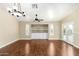 Spacious living area with custom built-ins, plantation shutters, offering both style and practicality in a bright setting at 23063 W Loma Linda Blvd, Buckeye, AZ 85326