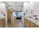 Bathroom with double vanity, granite countertops, walk-in shower and access to bedroom at 2452 W Muirfield Dr, Anthem, AZ 85086