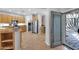 Spacious kitchen featuring stainless steel appliances, wood cabinets, and tiled floors at 2452 W Muirfield Dr, Anthem, AZ 85086