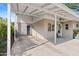 Spacious carport offering covered parking, dual entry doors, and a well-maintained exterior at 252 E Orange Dr, Phoenix, AZ 85012