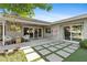 Outdoor patio with a covered lounge area, tile pavers, and backyard views at 252 E Orange Dr, Phoenix, AZ 85012