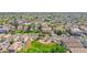 An aerial neighborhood shot featuring a playground and manicured green space at 2534 N 73Rd Dr, Phoenix, AZ 85035