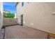Backyard featuring a wooden patio and door leading inside at 2534 N 73Rd Dr, Phoenix, AZ 85035