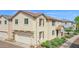 Charming two-story home with landscaped front yard, a driveway, and an attached two-car garage at 2534 N 73Rd Dr, Phoenix, AZ 85035