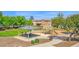 Neighborhood view of a covered picnic table and playground equipment at 2534 N 73Rd Dr, Phoenix, AZ 85035